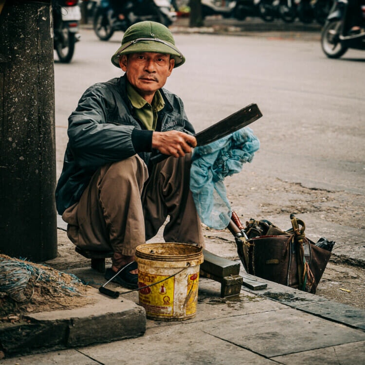 Blade Sharpening Man - Hanoi - Vietnam - Street Photography Documentary