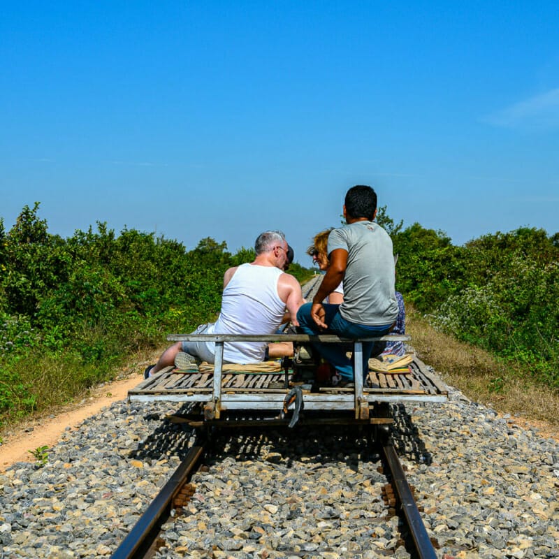 Following the Train Following the Train - Bamboo Train Battambang - Rural Cambodia - Street Photography Documentary