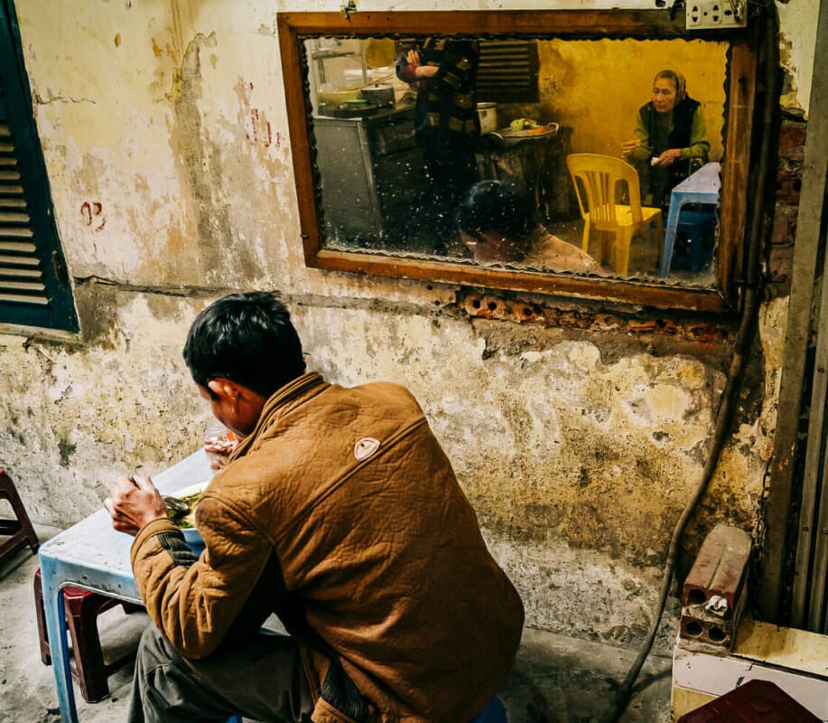 Reflecting over Lunch Reflecting over Lunch - Hanoi - Vietnam - Street Photography Documentary