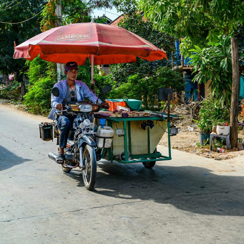 Fast Food Delivery Fast Food Delivery - Kampong Luong Silversmith Village - Rural Cambodia - Street Photography Documentary