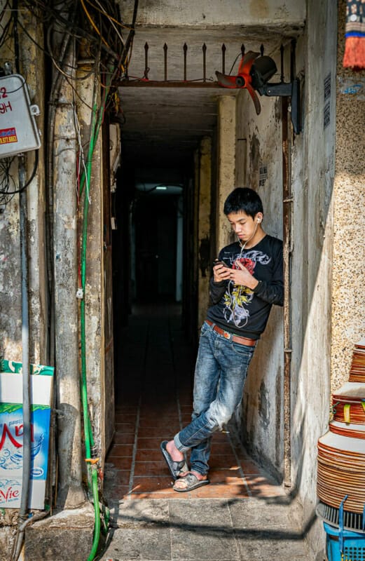 Boy in a Doorway Boy in a Doorway - Hanoi - Vietnam - Street Photography Documentary