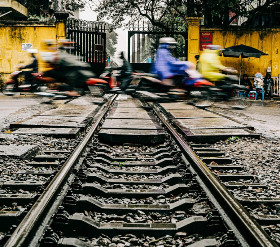 Crossing the Tracks Crossing the Tracks - Hanoi Train Street - Vietnam - Street Photography Documentary