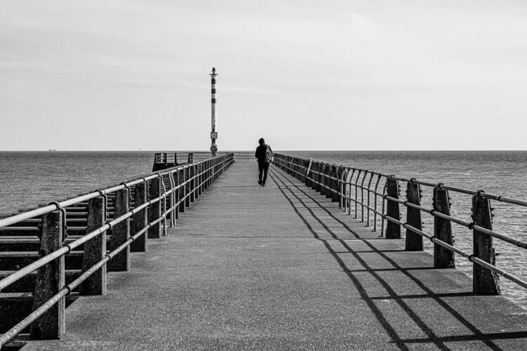 Figure On the East Arm - Newhaven Harbour